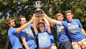 Cross Country team holding trophy