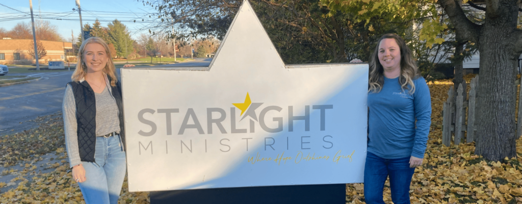 students in front of Starlight Ministries sign