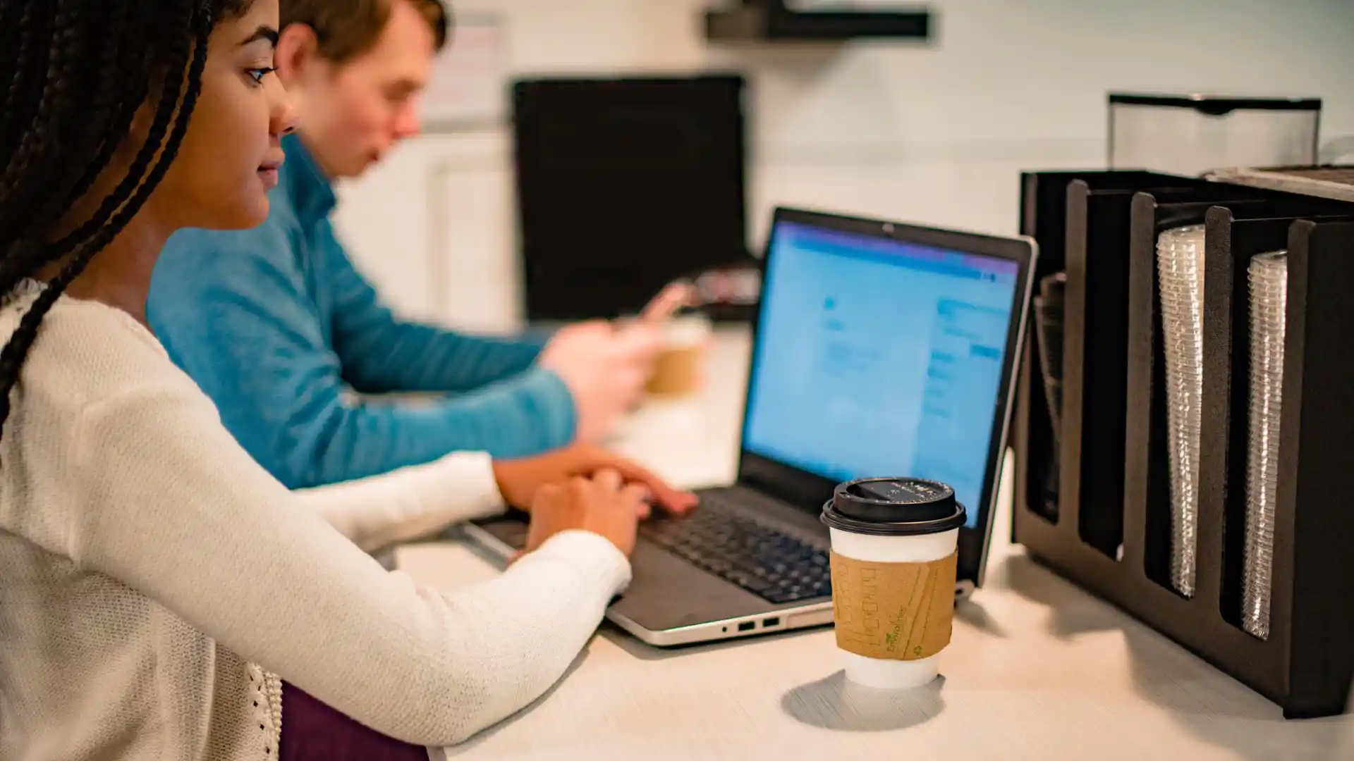 Business student in front of a laptop