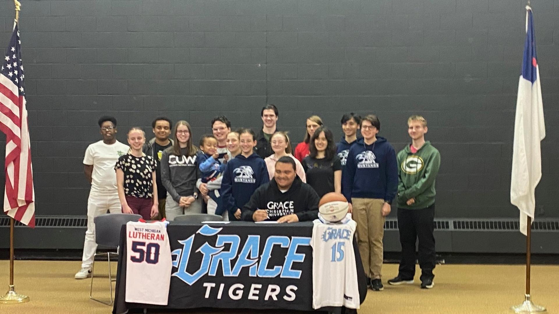 signing up great athletes for Grace Tigers