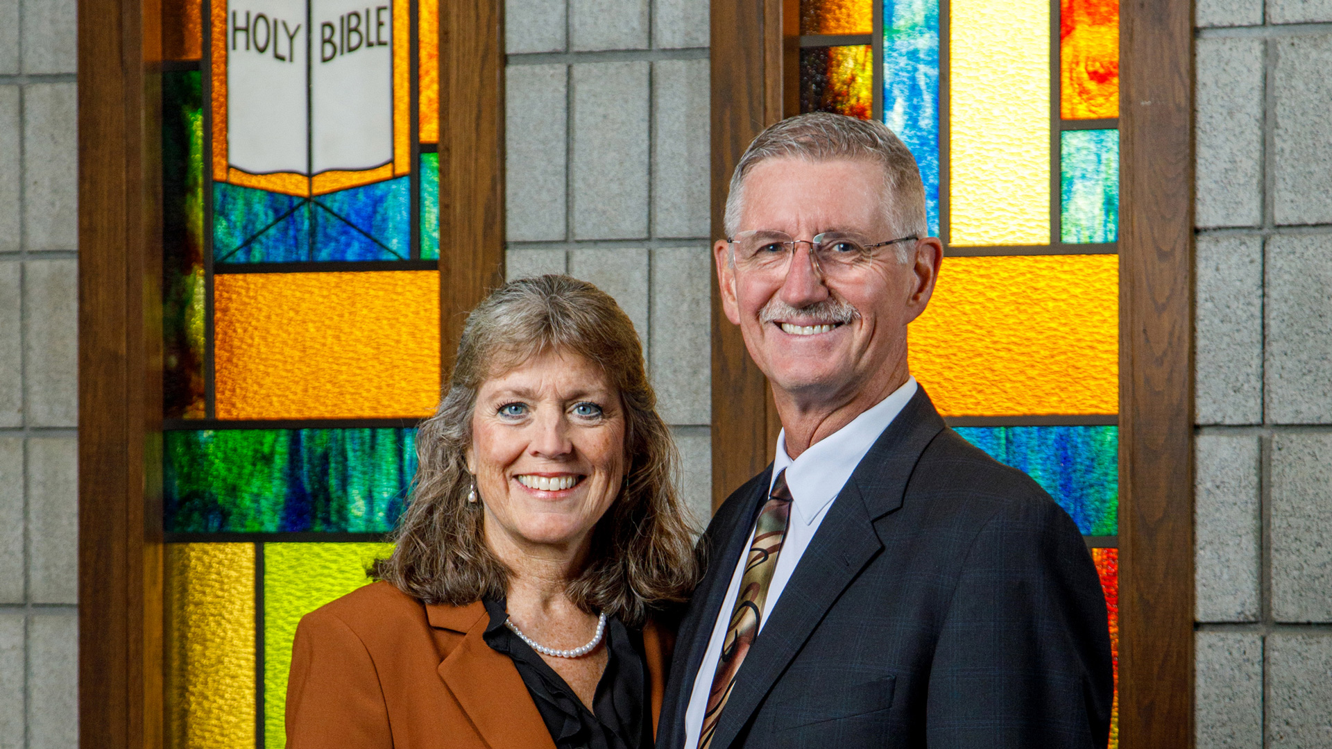 President Ken & Kathy Kemper in Baker Chapel at Grace Christian University