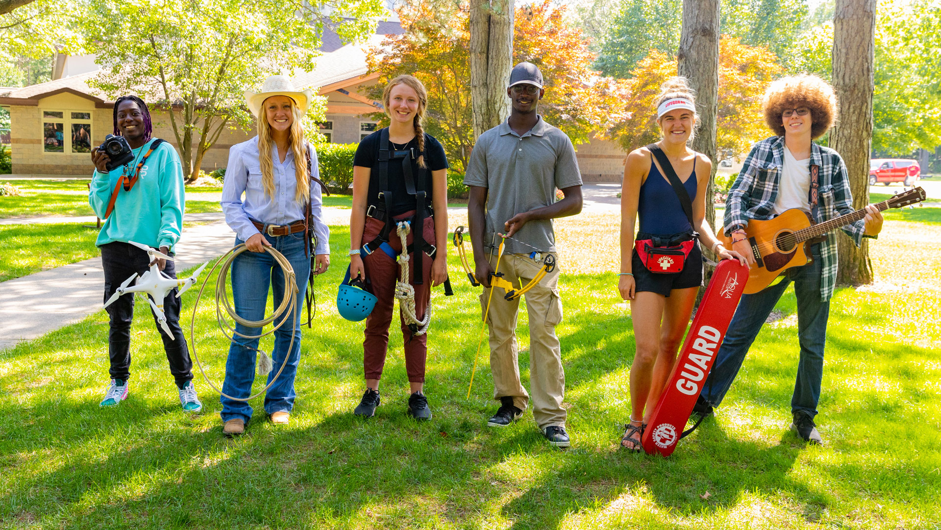 A group of Grace Adventures interns representing the variety of activities Grace Adventures offer.