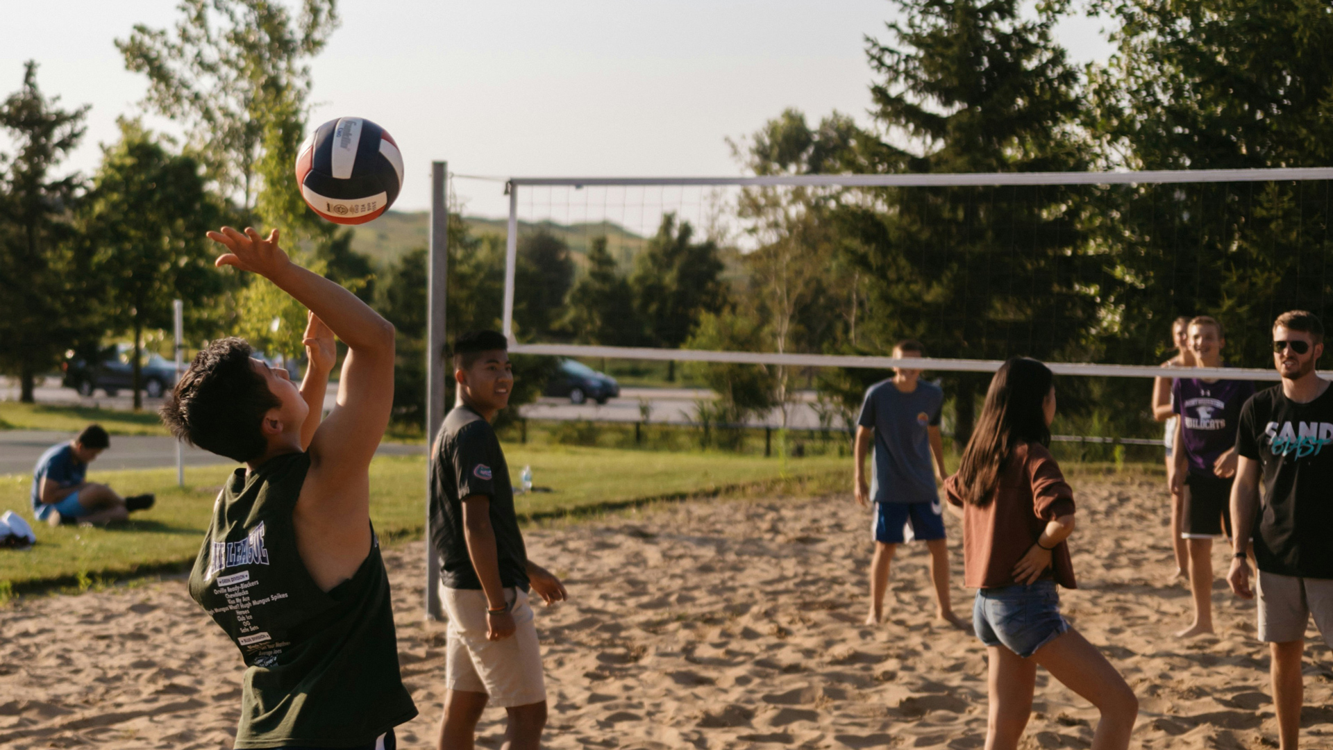 Grace students playing Outdoor Sand Volleyball