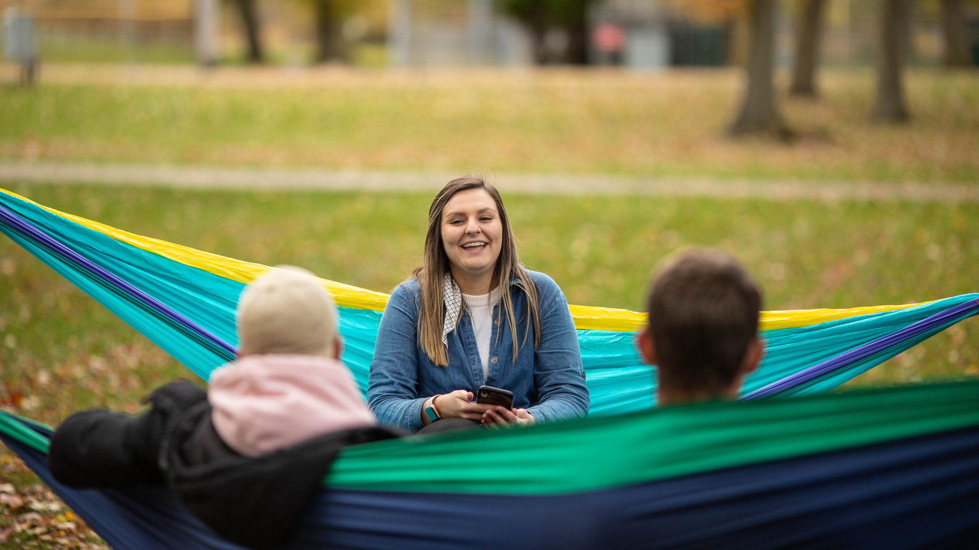 Grace students sitting in hammocks at Pinery Park.