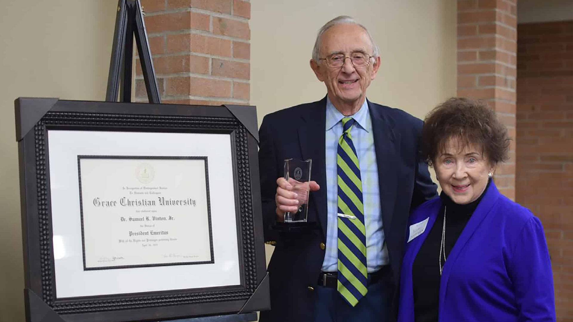 Dr. Sam Vinton as he was presented with President Emeritus status, with his wife, Becky