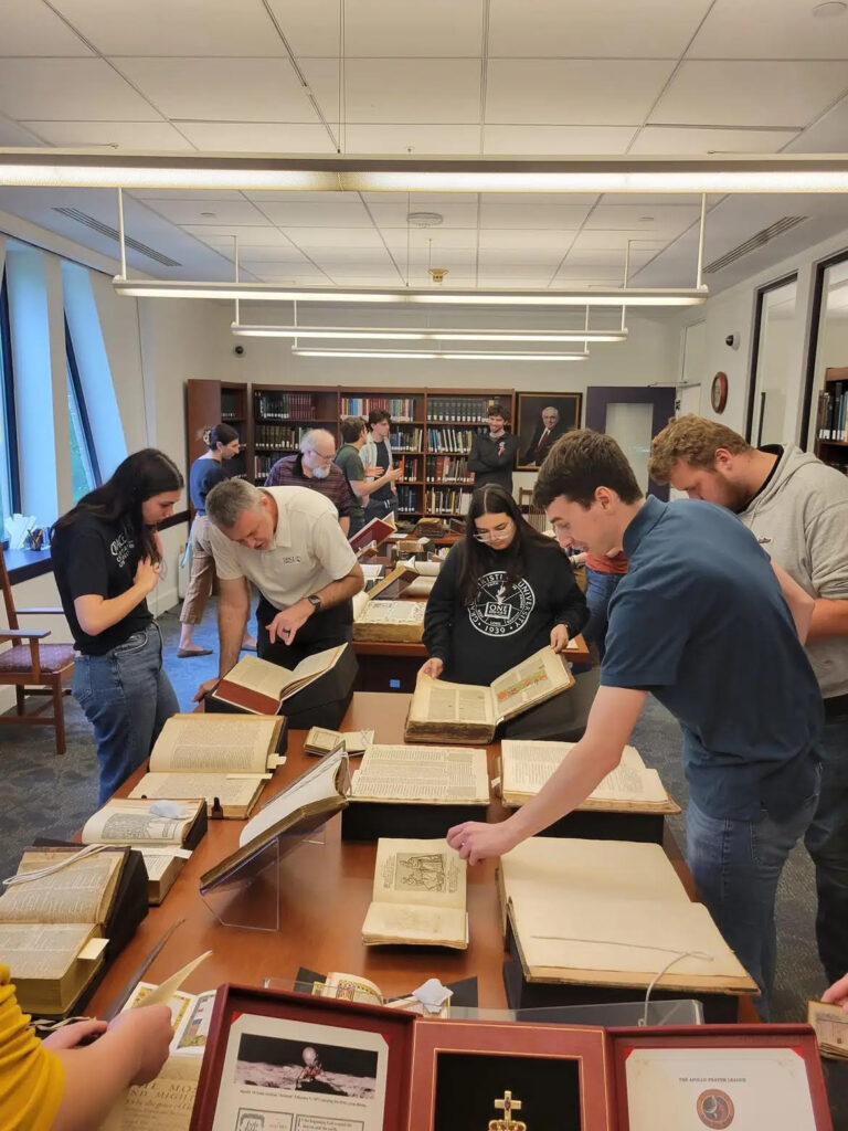 Students Studying Old Manuscripts