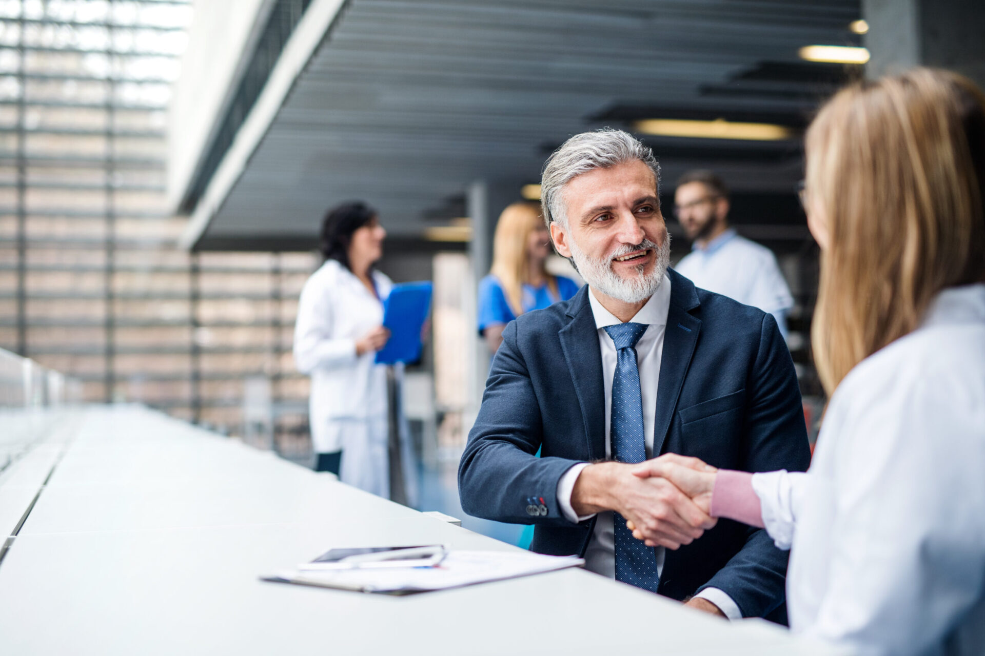 Two business people shaking hands