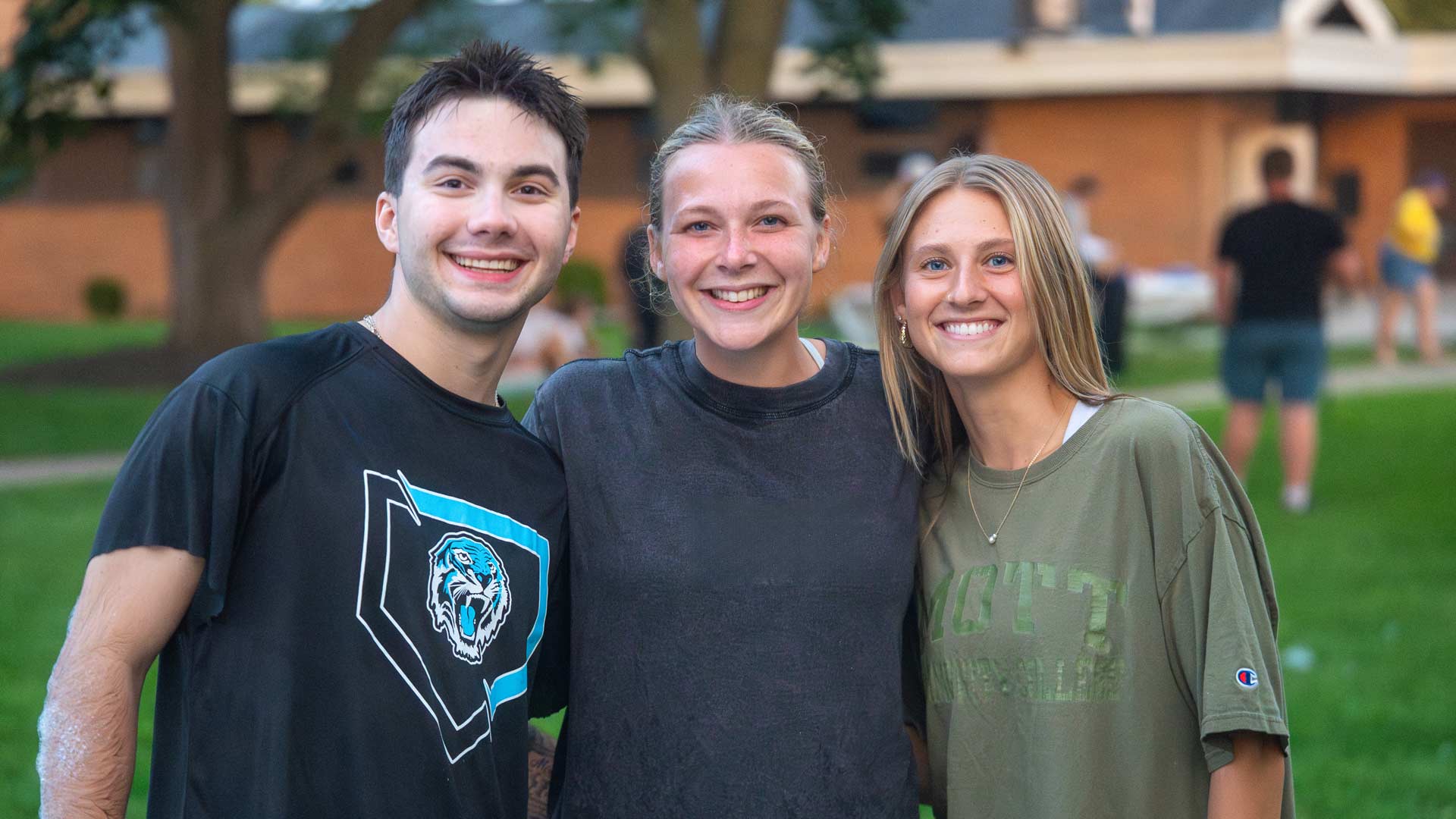 A group of Grace students outside on campus