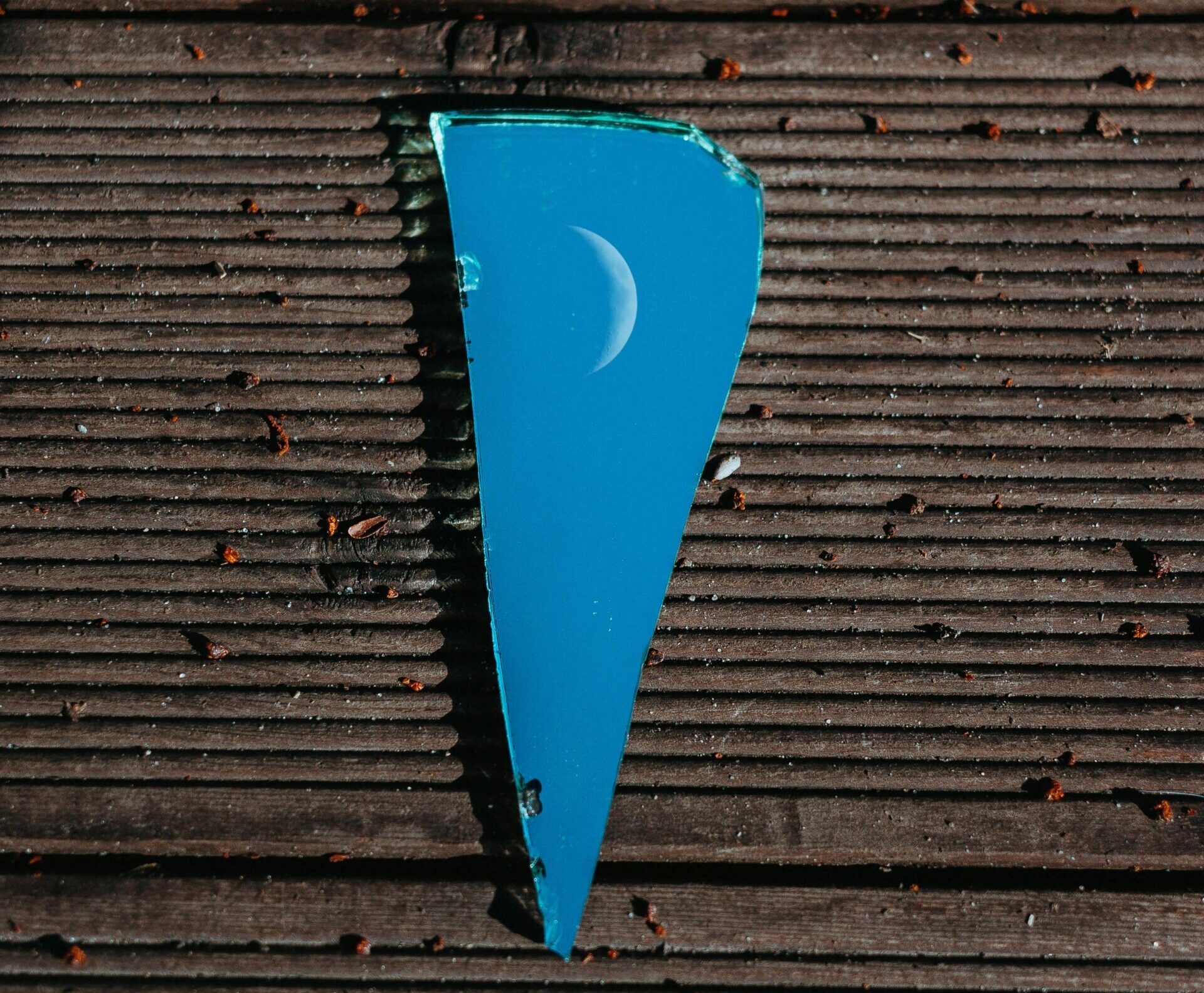 moon-reflecting-on-broken-glass